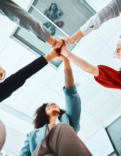 Hands, team and high five in support for business collaboration, unity and trust below at the office. Hand of creative people in teamwork agreement for company success, partnership and goals at work