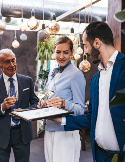 Corporate business people meet and drinking on a celebration event in a luxury hotel restaurant