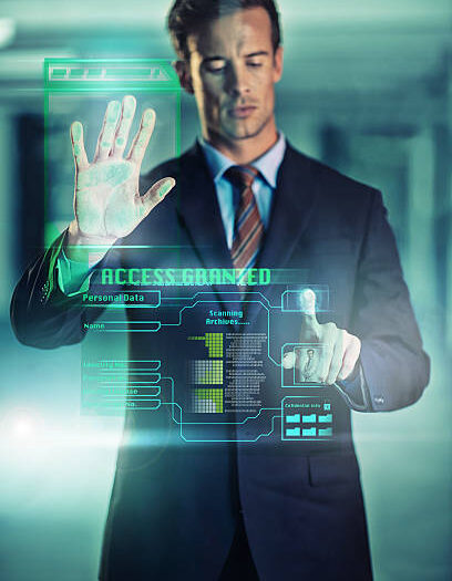 Cropped shot of a handsome young businessman using a digital interface